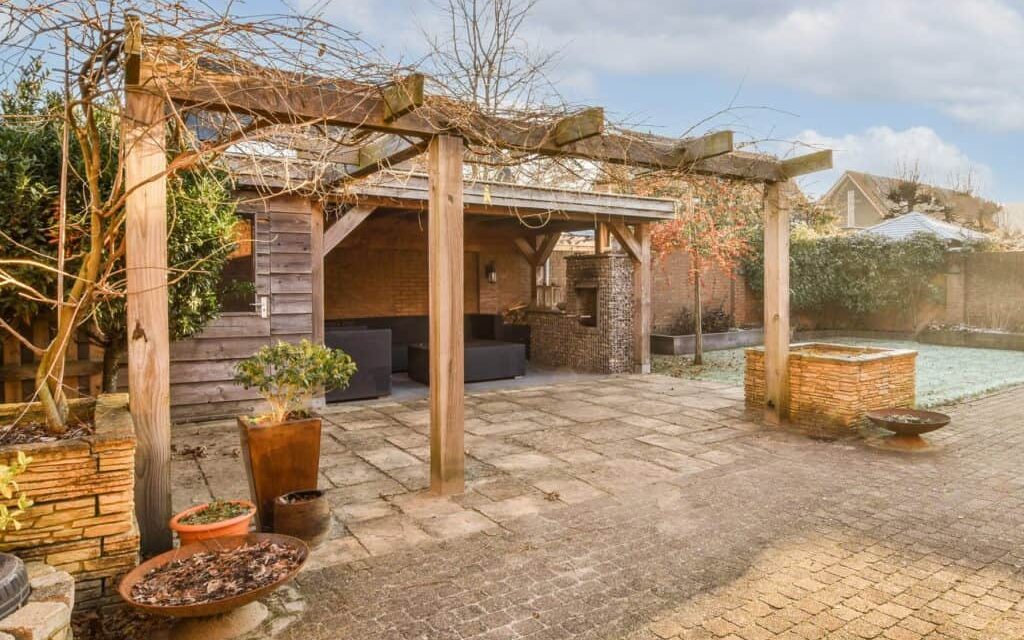 a-backyard-with-a-pergola-and-a-pool-e1739194866288-1024x805